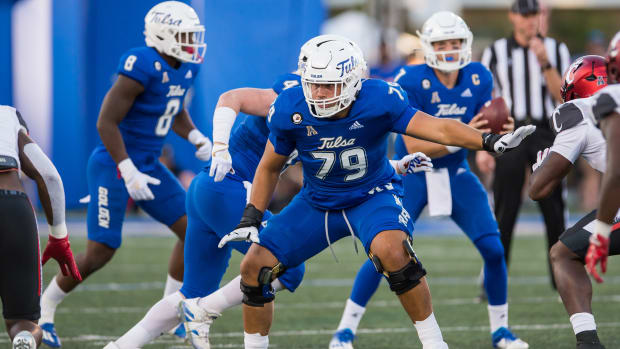Oct 1, 2022; Tulsa, Oklahoma, USA; Tulsa Golden Hurricane offensive lineman Jaden Muskrat (79) blocks during the first quarter against the Cincinnati Bearcats at Skelly Field at H.A. Chapman Stadium. Cincinnati won 31-21. Mandatory Credit: Brett Rojo-USA TODAY Sports
